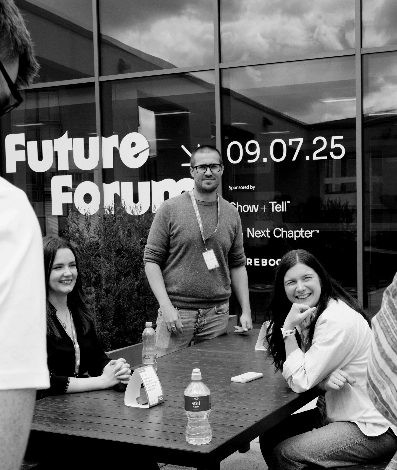 Team standing outside office